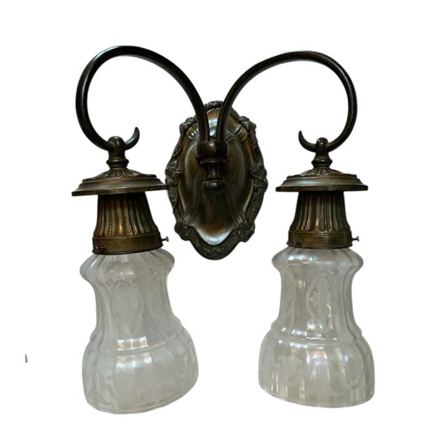 These rare art glass wall sconces look so beautiful when illuminated. The rare acid etching and fluted style are classic...