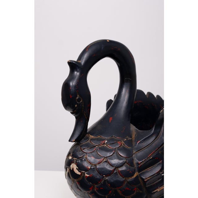 Love this Large Wooden Swan. Black with Red underlay. Plant stand? Looks great in your Hall Way or Room. so decorative.