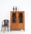 An elegant small Biedermeier display cabinet from the first half of the 19th century. Crafted from solid cherry wood. Good...