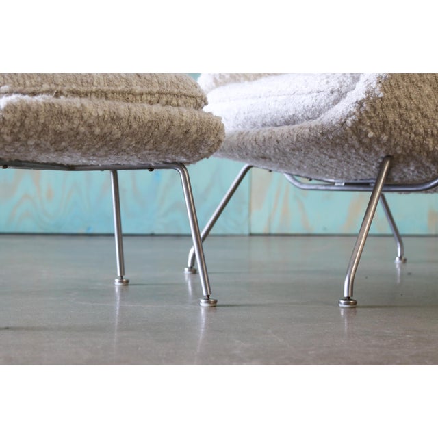 A vintage womb chair and ottoman designed by Eero Saarinen for Knoll. Reupholstered in a thick nubby textured wool blend...