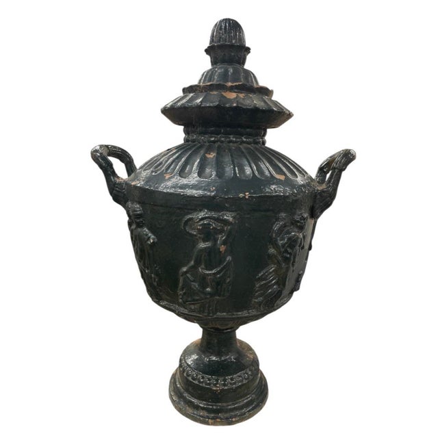 Elevate your interior or garden decor with this striking pair of vintage cast iron urns, featuring exquisite classical...
