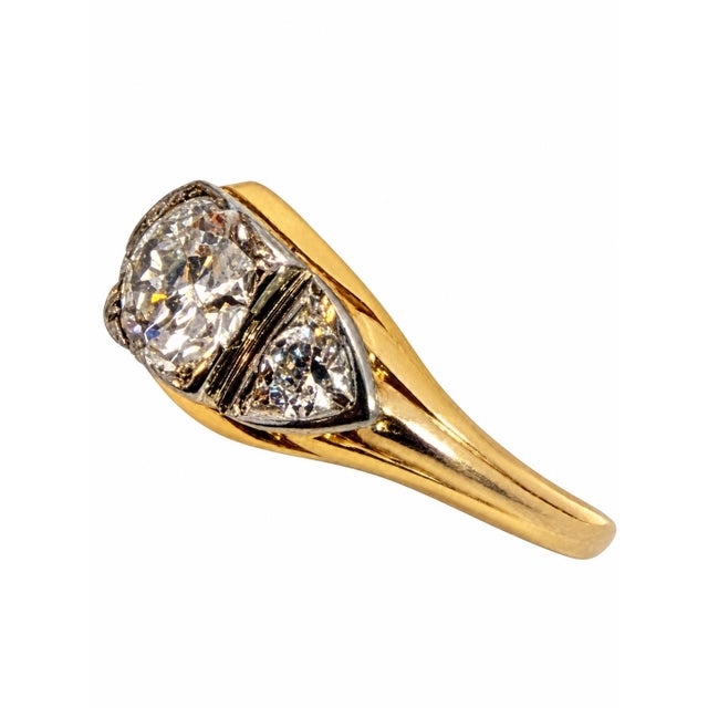 Vintage 1.49 Carat Total Weight Old European Cut Diamond Ring in 14K Yellow Gold and Platinum A beautifully balanced...