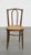 Offered this nice timeless bistro chair in the style of Thonet with a braided wicker seat. This nice bistro chair in the...