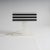 This modernist table lamp features a distinctive geometric silhouette crafted from frosted and black acrylic glass. Its...
