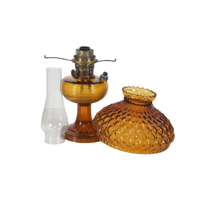 Circa 1930-1955 Mantle Lamp Company Aladdin Nu Type Model B oil lamp. Grooved amber glass beehive base and quilted /...