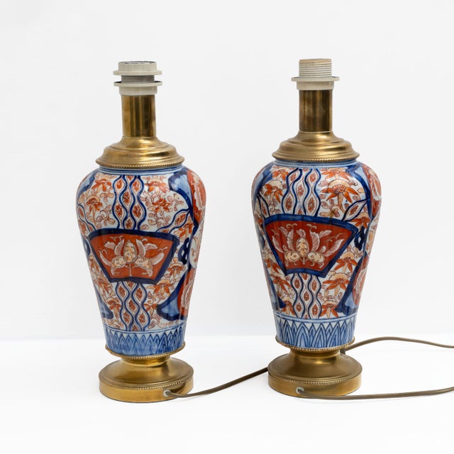 Elegant pair of Japanese Imari porcelain vases, dating from the Meiji period (1868–1912), later adapted as table lamp...