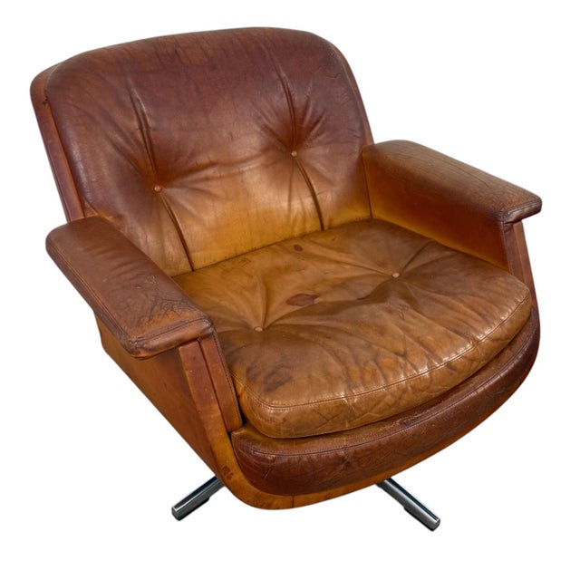 An attractive pair of vintage lounge chairs manufactured by Eugen Schmidt GmbH, Germany, combining exceptional comfort...