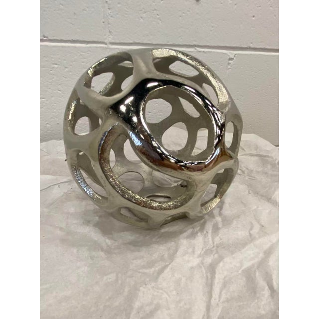 These elegant silver balls beautifully accent todays surroundings.