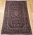 Beautiful vintage Persian Kashan area rug, meticulously hand-knotted in the early 1900s. This exquisite piece embodies the...