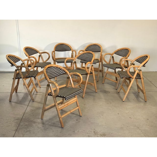 Set of 8 folding bamboo chairs from the 90s, nylon seat.