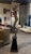 Early 21st Century Gold Tone “Woman Playing Flute” Recycled Steel Sculpture on Pedestal For Sale - Image 5 of 7