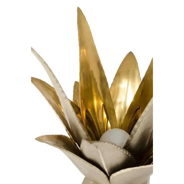 Table lamps manufactured at the Maison Charles workshop and designed by Jacques Charles in a symphony of gilded and...