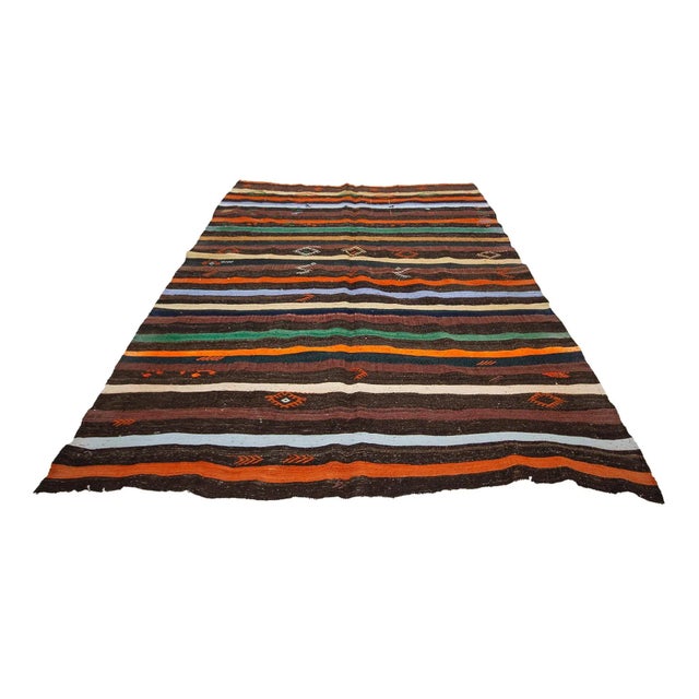 Handwoven vintage decorative kilim rug from Kars region of Turkey. Approximately 45-55 years old.In very good condition.
