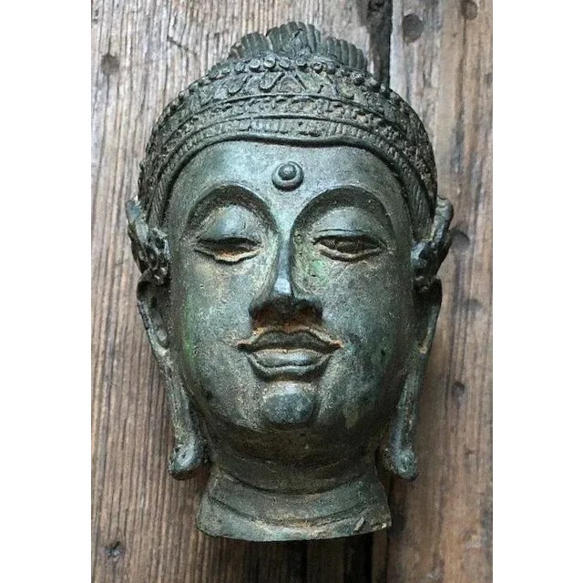 Antique Bronze Bust of Buddha Mounted on a Wood Stand For Sale - Image 4 of 11