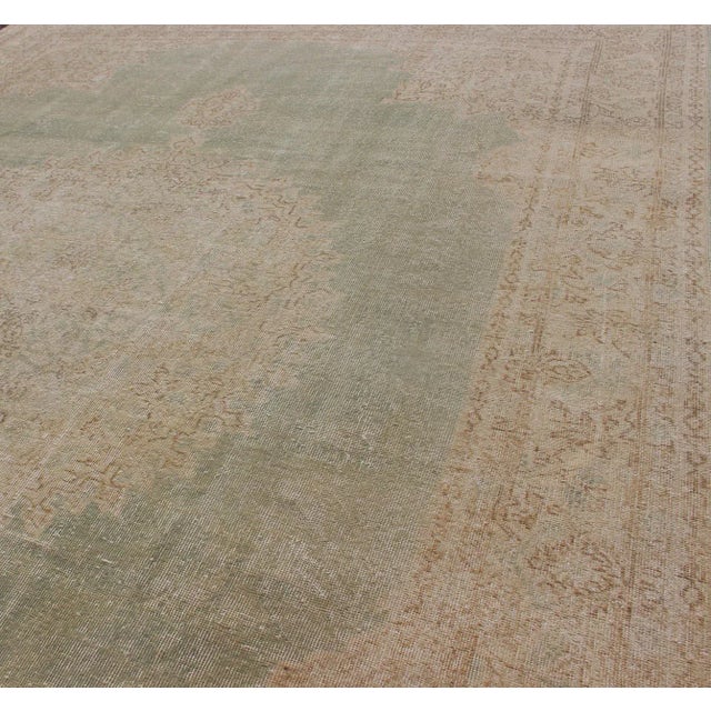 Mid 20th Century Distressed Turkish Rug With Floral Medallion in Light Green, Tan and Taupe For Sale - Image 5 of 13