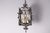 This elegant 20th-century French lantern showcases the timeless artistry of wrought iron craftsmanship. Its intricate...