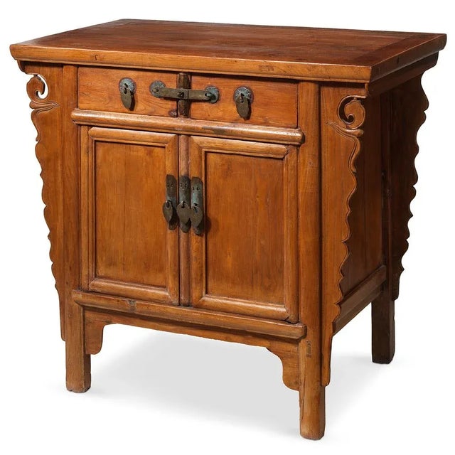 This charming cabinet crafted from elm is sourced from the city of Linyi in northern China's Shandong province. Its...