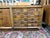 Classic Mid-Century Modern walnut credenza. Three working drawers and two side cabinets with beautiful wood checkering.