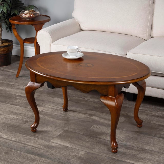 Selected solid Woods, Wood products and choice veneers. Cherry veneer top with linen-fold inlay design of maple and walnut...