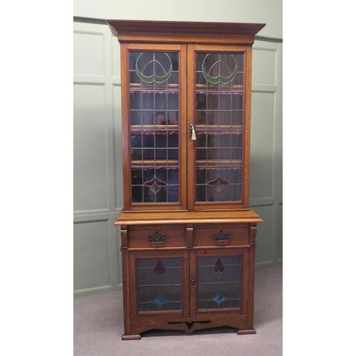 Arts and Crafts Golden Oak Bookcase This is a tall elegant piece, dating from the later part of the 19th Century, the...