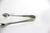 Small vintage silver plated sugar tongs. They have tarnish, scratches and patina from age and use. Nice and heavy. They...