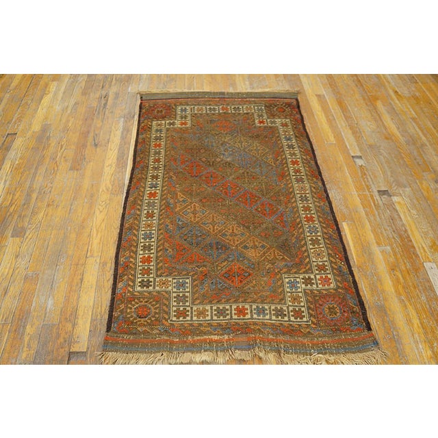 Antique Baluch-Turkmen rug. Size: 3'0" x 5'3". Antique Baluch Persian Brown 1890s Rug, Circa Date: 1890s. This exceptional...
