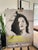 Exhibition poster featuring Art Must Be Beautiful, Artist Must Be Beautiful (1975) by Marina Abramović, one of the most...