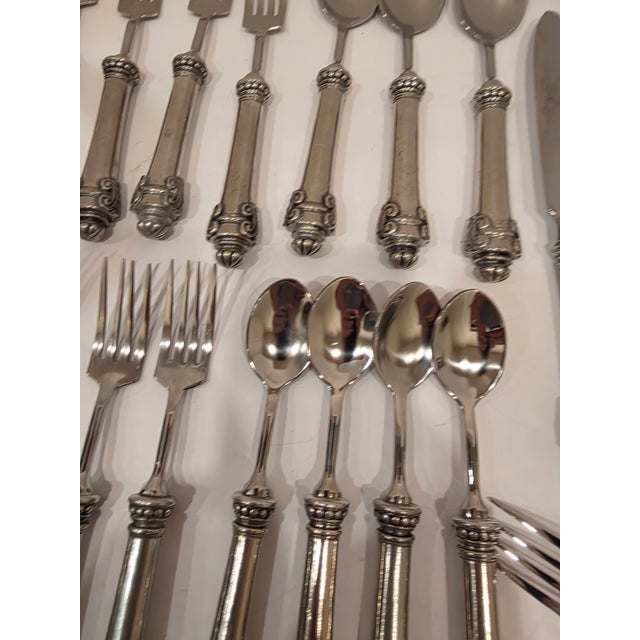 Stunning vintage Vagabond House flatware in the Medici pattern. There are 19 pieces...missing one large spoon or it would...