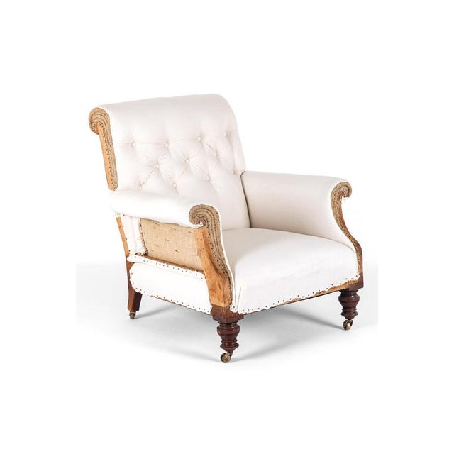 A large 19th century Victorian button back armchair of generous proportions and of outstanding quality in the country...
