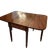 An elegant antique mahogany Pembroke table dating to the late 18th or early 19th century. This versatile table features...
