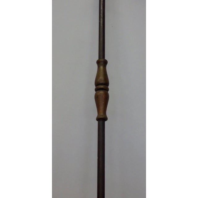 Iron fireplace tool attributed to Cranbrook forge Michigan. Wrought and forged steel with brass embellishments. Nicely...