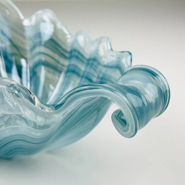 Beautiful blue art glass vase made in Italy in the 1990s. The vintage vase is in very good vintage condition, with no...