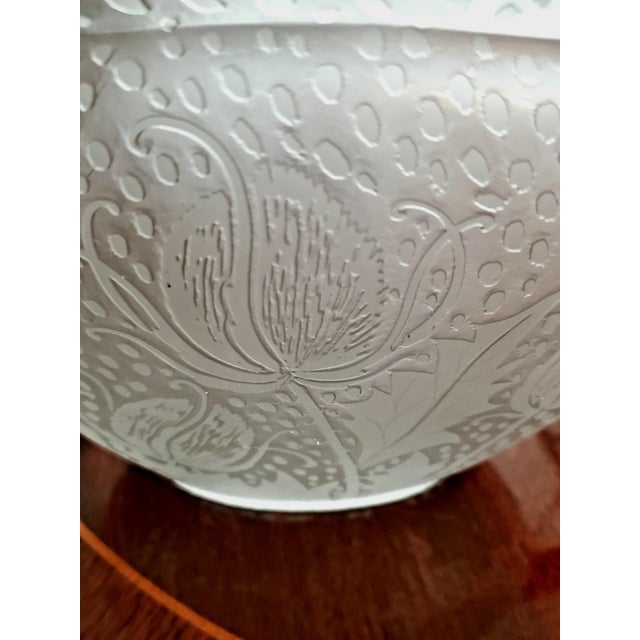 A striking molded, pressed, and frosted glass art vase produced by the historic Parisian workshop, Établissements Leune,...