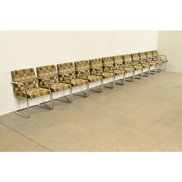 An exceptional set of twelve Mid-Century Modern "Brno" style tubular cantilever lounge chairs or club chairs In the manner...