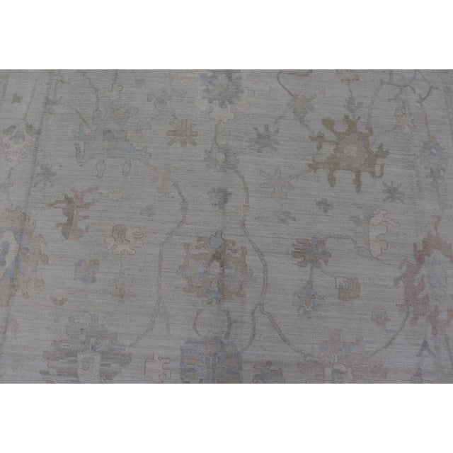 Large Modern Oushak Rug in Soft Gray With Faded Pastel Motifs and Subtle Design For Sale - Image 9 of 15