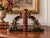 A striking pair of French Art Deco bookends, circa 1930, featuring two graceful leaping antelopes sculpted above stylized...
