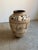Antique Chinese pottery storage jar in the manner of Cizhou ware, likely dating to the Ming Dynasty (1368–1644). The...
