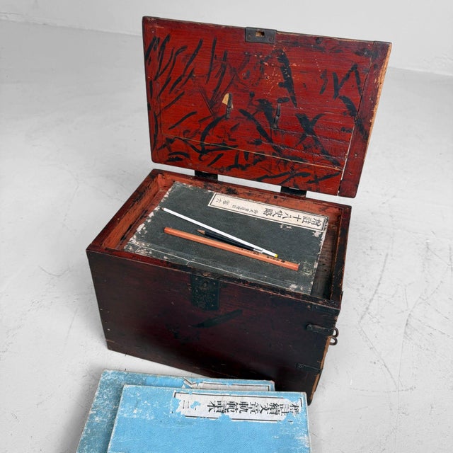 A rare Japanese wooden suzuribako, or calligraphy box, dating from the early Meiji period. Dimensions: height 21 cm, width...