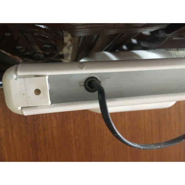 Adjustable German metal ceiling lamp, 1970s, for 3 bulbs, one max 75W. Everything is made of metal, except for the ends on...