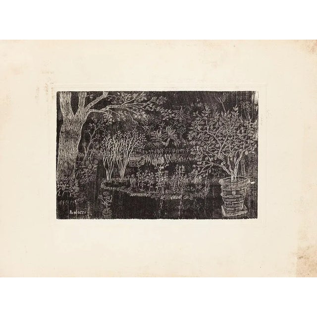 The Garden is an original print realized by Eduardo Paolozzi. Signed on plate on the lower left. Mint condition (some...