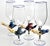 An impressive group of entirely hand blown art glass goblets, showcasing the whimsically sculptured bird forms mounted on...