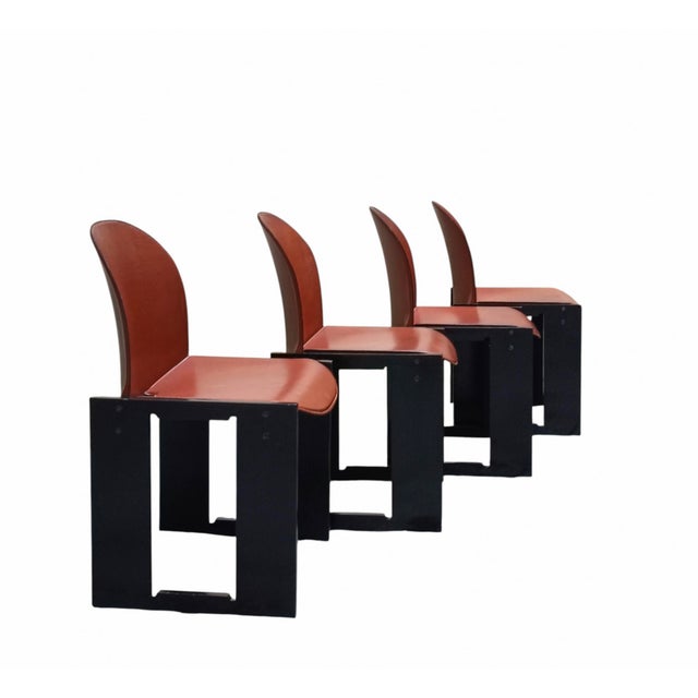 Important set of four chairs, model “Dialogo” by Afra & Tobia Scarpa for B&B Italia. The frame is typically made of black...