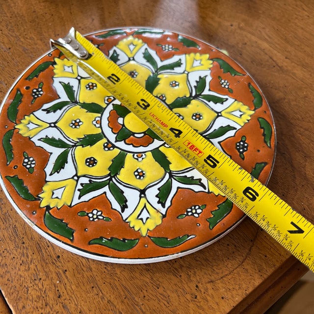 Up for consideration is a beautiful ceramic painted wall hanging from England. This piece would look lovely in your home...