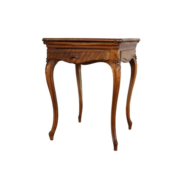 The 19th-century French Green Felt Top Game Table is a charming and sophisticated piece that captures the leisure and...