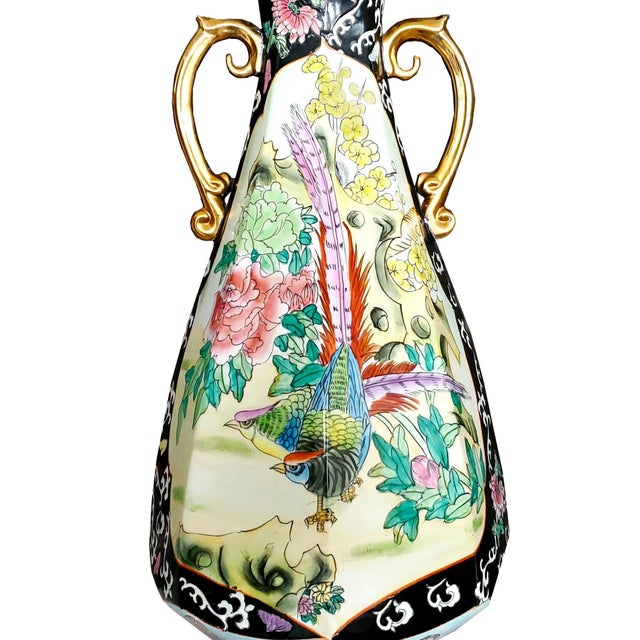 Offering a monumental 26 inch "OCTAGONAL" hand painted Chinese Porcelain Floor Vase with a pair of birds on both front and...