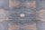 This Modern Hand-Knotted Wool Rug exudes a serene and sophisticated aesthetic through its intricate, geometric pattern and...