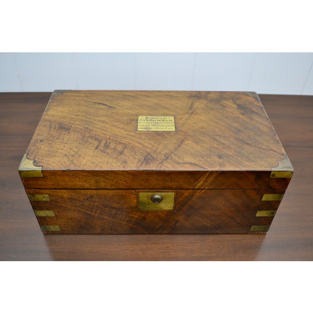 Impressive English writing slope or travel desk with thoughtful dedication. Well constructed of solid walnut with brass...