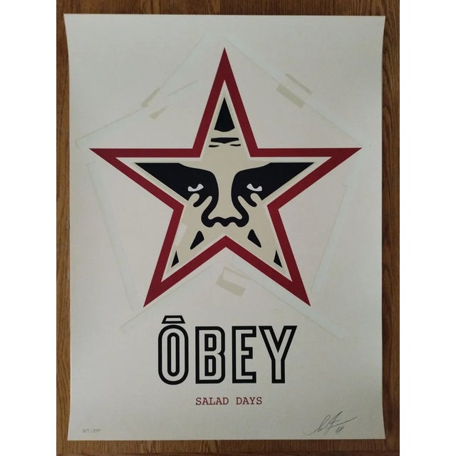 Dimensions 61 x 46 cm Screenprint on cream Speckletone paper. Signed by Shepard Fairey Edition number 550 Year 2018 This...
