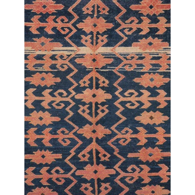 An antique East Turkestan Kirghiz carpet from the turn of the 20th century. Measures: 6' 6" x 11' 4"