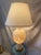 Beautiful antique table lamp carved out of alabaster with floral motif. Has one small chip you can see in the picture,...